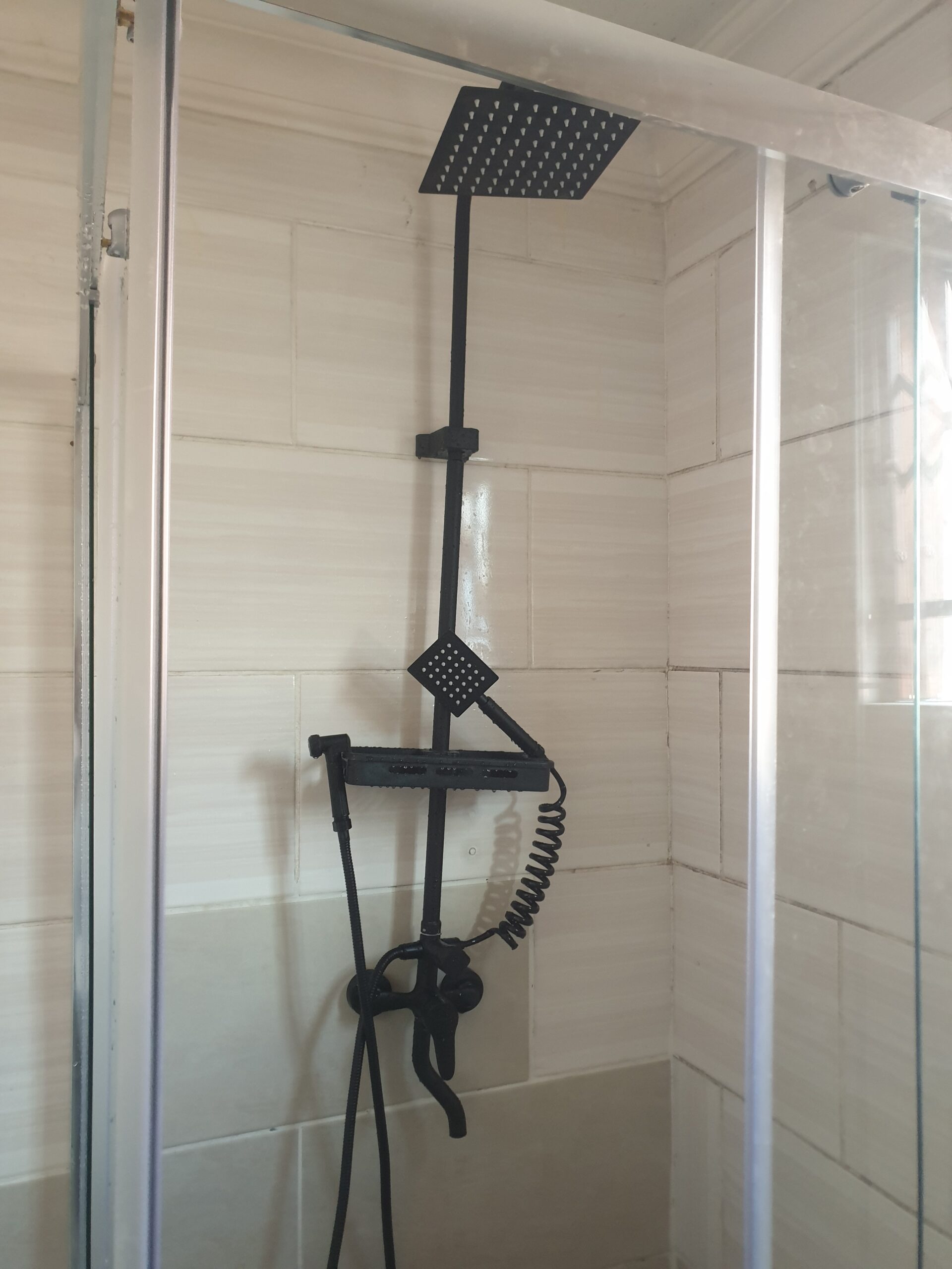 Professional shower installation by plumber in Cape Town CBD - luxury bathroom renovation in city centre apartment